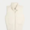 Vestă Y2K cu glugă și bordură din blană artificială Vestă Y2K cu glugă și bordură din blană artificială